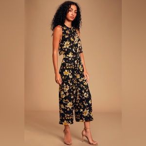 Lulu’s black and gold multi-print sleeveless jumpsuit. Size S.